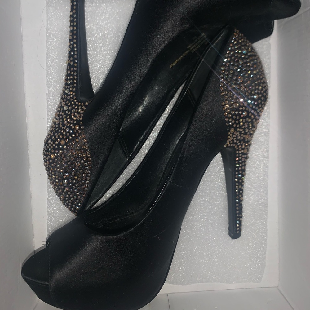 Black satin bejeweled Steve Madden peep toe pumps